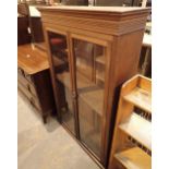 Large four shelf bookcase with twin glazed doors