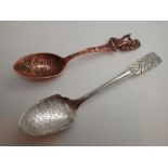 Two spoons one Oriental silver and one U