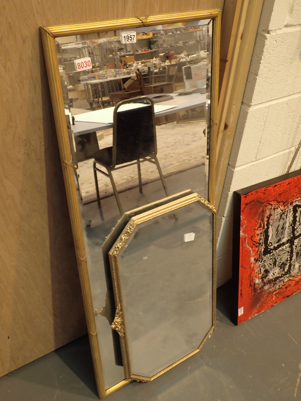 Two bevelled edge gilt framed mirrors