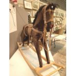 Rocking horse with brown plush hair brow