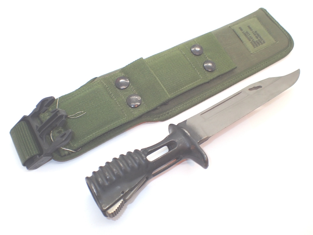 Modern short army bayonet with frog