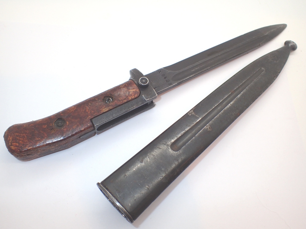 Wooden handled bayonet and sheath numbered 442