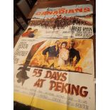 Two vintage film posters The Canadians and 55 Days at Peking 100 x 75 cm