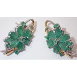 Silver fancy pear cut emerald set flower earrings approximately 5.