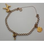 9ct gold charm bracelet L: 53 cm 8.