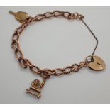 9ct gold charm bracelet 18.