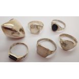 Six mixed silver rings