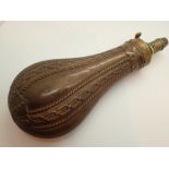 Copper and brass antique powder flask with chain decoration