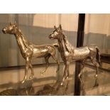 Two silver plated brass horses