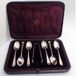 Cased set of six hallmarked silver tea spoons with tongs assay London 1895