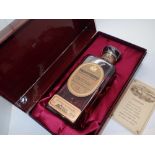 Bottle of Knockando single malt whisky 24 years old distilled 1965 and bottled 1989 43 proof