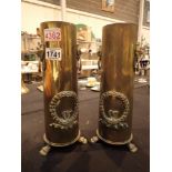 Two Trench Art 18 pounder shell cartridge cases dated 1916 with victory laurels and lion mask and