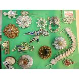 Sheet of costume jewellery brooches