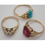 Three 9ct gold stone set rings mixed sizes