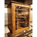 Antique oak smokers box with glazed door