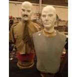 Two male torso dummies one dressed in military shirt and tie