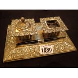 Victorian brass ink stand decorated with vines and devils masks