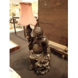 Oriental carved Buddah table lamp with small lizard with decorative silver inlay approximately 51
