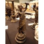 Bronzed spelter figurine of a woman signed Pancitta France H: 47 cm