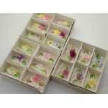 Eighteen boxed Coalport floral place markers