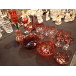 Quantity of cranberry and ruby glass to include a ruby decanter cranberry bowl jugs and glasses