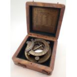 Boxed brass sundial and compass marked Steward
