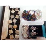 Quantity of jewellery includes silver earrings and stone fossil and pearl necklace