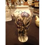 Moorcroft vase in the Sweet Pea pattern H: 22 cm