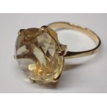 9ct gold ring set with a large white stone size S / T 7.