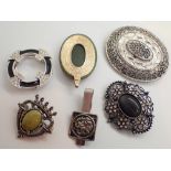 Assorted white metal brooches