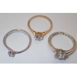 Three 9ct gold solitaire rings gross 6.