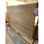 Large woollen beige ground rug 230 x 170 cm
