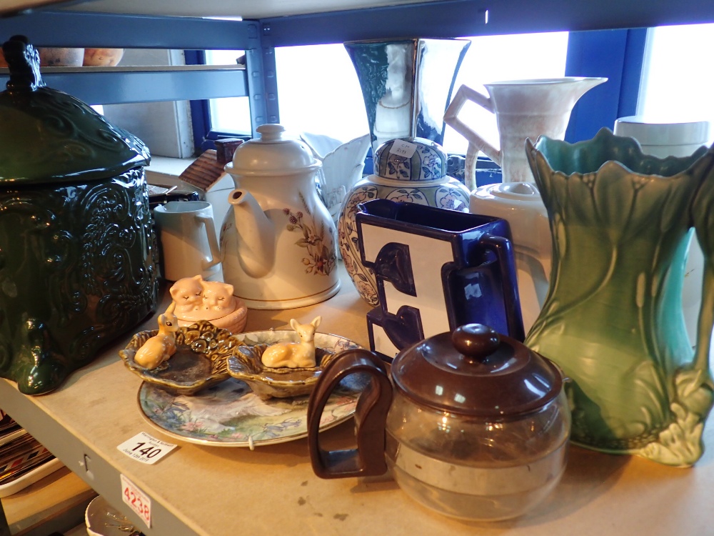 Shelf of mixed ceramics