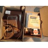 Delmonta Monteflex TLR camera with a small box of accessories