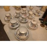 Ten trios Roslyn China Garland pattern teaware