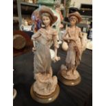 Pair of cast figurines