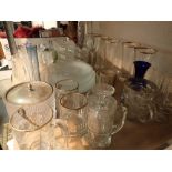 Two shelves of mixed glassware