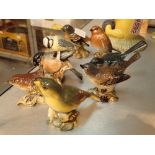 Eight ceramic Beswick birds CONDITION REPORT: Robin and white throat have chipped