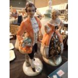 Pair of Continental ceramic figurines H: 37 cm