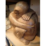 Carved wooden lovers in embrace figurine H: 32 cm