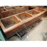 Very large glazed earthenware animal feeding trough with three feeding compartments and one with