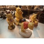 Royal Doulton Winnie the Pooh figurines Pooh Began to Eat The Armchair Paw Marks and The Present