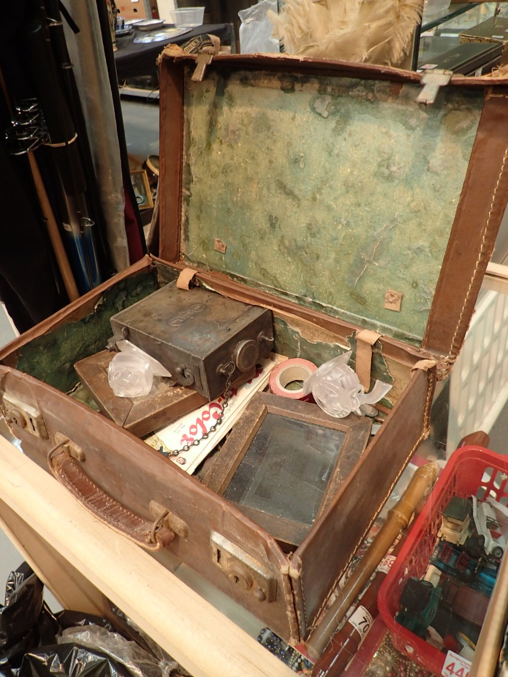 Vintage suitcase with collectable contents