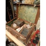 Vintage suitcase with collectable contents