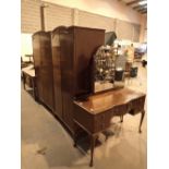 Two mahogany Beithcraft two door wardrobes and a matching dressing table with bifold mirror