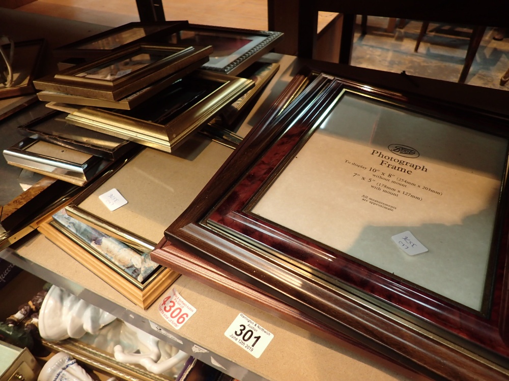 Shelf of mixed photo frames