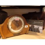Pendragon leather briefcase with Agatha Christie DVD box sets and a Westminster chime mantel clock