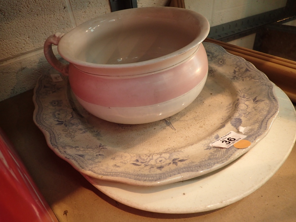 Two large blue and white carving plates and a ceramic potty