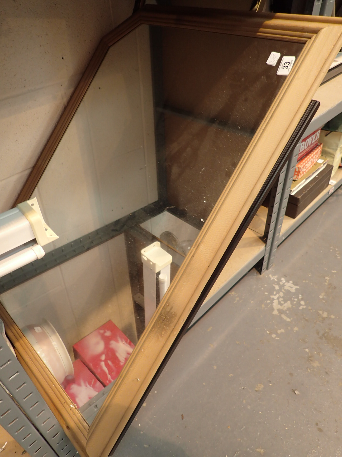 Three mixed wall mirrors including pine framed example