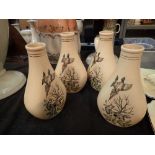 Four Beswick hunting themed bottle vases